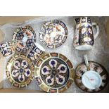 Royal Crown Derby cups and saucers plus cream jug: One tea cup and two coffee cups all with saucers,