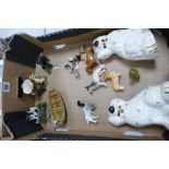 A mixed collection of items to include: Beswick dogs, Wade whimsies, etc