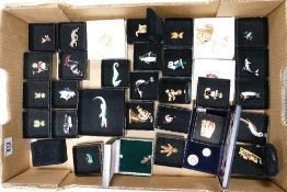 A collection of Enameled & Jeweled Costume Jewelry Booches: with animal, fish & novelty theme