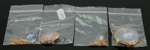 A collection of four Wedgwood Jewelry items to include: brooches & cameo & chain sets(4)