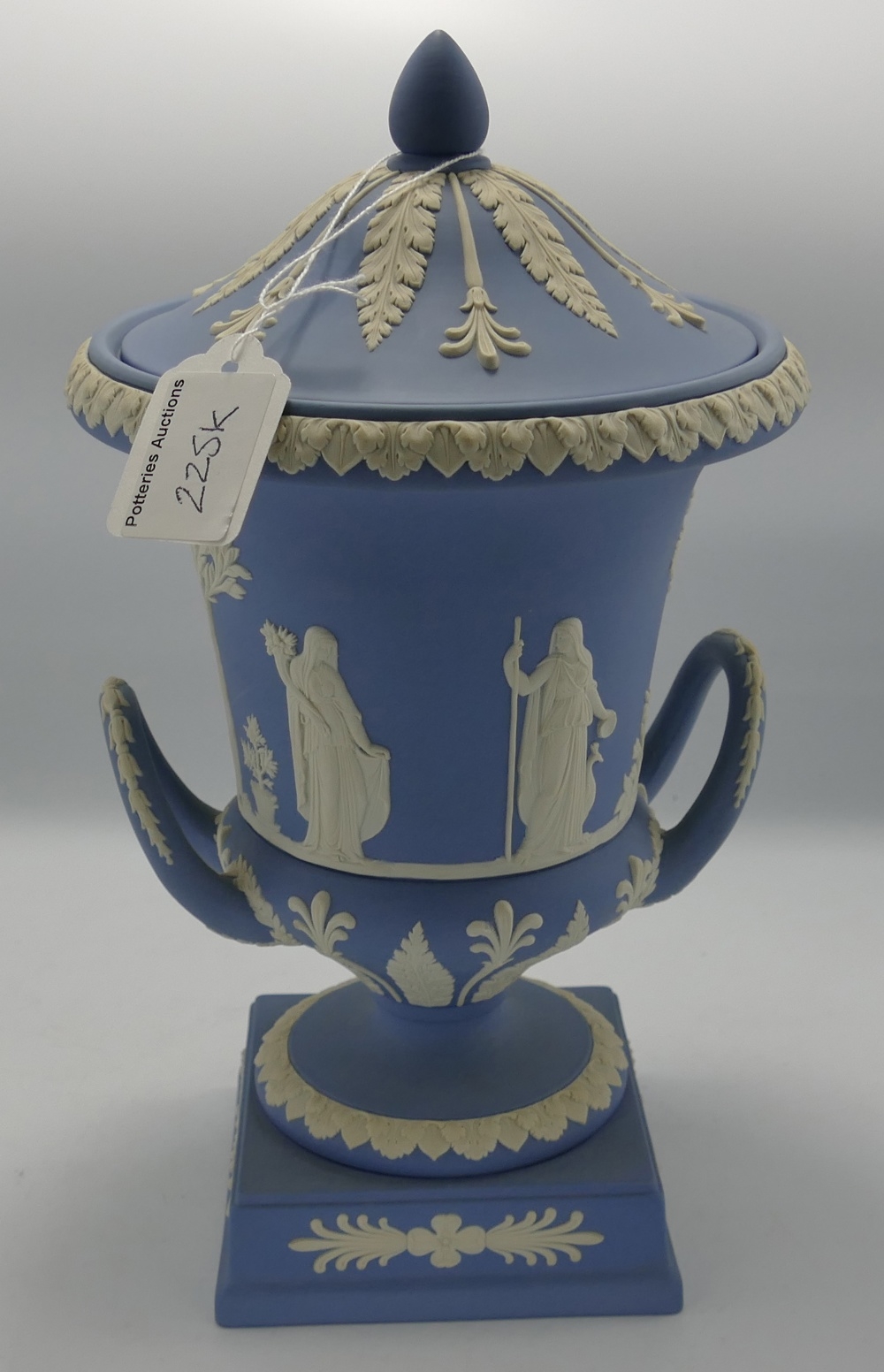 Wedgwood blue & white Jasperware two handled Urn & cover: Dated 1973, height 30cm.