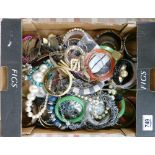 A collection of ladies silver plated and costume jewellery: Including bangles, strings of various