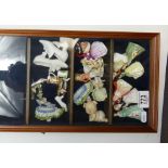 Small display cabinet containing 19 ceramic miniatures: Includes Royal Doulton miniature special