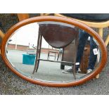 Large Edwardian Inlaid Oval Mirror: length 79cm