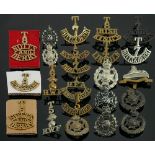 23 x Military cap badges and Territorial arm badges: Badges appear of differing ages, and is not