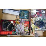 A collection of Costume Jewelry to include: beads, brooches, chains etc