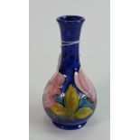 Moorcroft vase in magnolia pattern: 16cm high in good condition. Impressed Moorcroft.