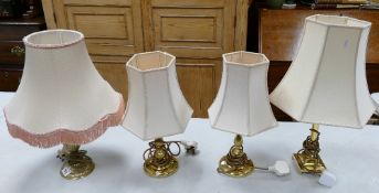 Four brass lamp bases: with shades