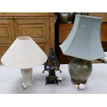 Two ceramic lamp bases: with shades together with a glass and metal table lamp