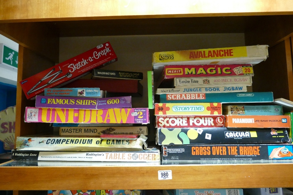 A large collection of vintage games & jigsaws to include: Uni Draw, Avalance, Merit Magic,