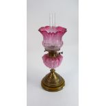 Victorian oil lamp: Pink opaline glass bowl, with brass and potter base. Old cranberry shade,