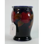 Moorcroft vase in the pomegranate pattern: 13cm high, impressed Moorcroft and signed in blue.
