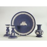 A Collection of Wedgwood Queens Blue items to include: dancing hours candlesticks, vase & wall plate