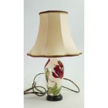 Moorcroft table lamp with shade: Height to top of ceramic base, excluding brass fitting 23.5cm.