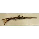 Eastern snaphaunce flintlock wall display rifle:with ivory inlay.