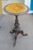 Carved and inlaid Victorian wine table: A fine quality piece.