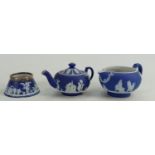 A collection of 19th century Wedgwood dip blue items to include: Miniature teapot, cream jug &