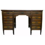 Early 20th century Aesthetic carved Walnut 9 drawer Knee Hole desk: With vinyl top, length 121cm,