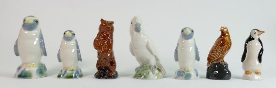 A collection of Wade decanters: Including Penguins, Cockatoo, Bear and Eagle. (7)