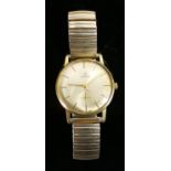 Omega antimagnetic gentlemans vintage wristwatch: gold plated and stainless steel with expandable