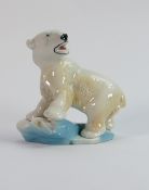 Wade model of a Polar bear with fish on glacier: Height 15cm.