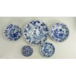 A collection of 17th century Kangxi period blue and white porcelain dishes: Comprising of a set of 3