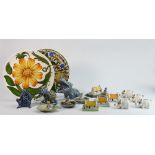 A collection of Irish Wade porcelain items: Including ICI seated man, seated hippo, donkey, pair