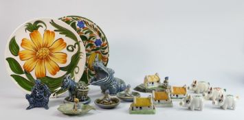 A collection of Irish Wade porcelain items: Including ICI seated man, seated hippo, donkey, pair
