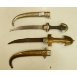 Two Indian daggers with silver handle and scabbards: largest L46cm (2)