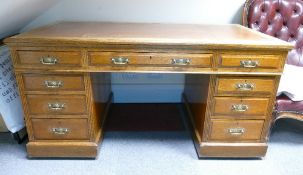 Edwardian Oak pedestal writing desk: Measures 152cm x 82cm x 67cm approx.