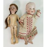 German vintage porcelain doll with moving eyes together with another porcelain head doll: Missing