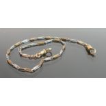 Yellow coloured metal gold watch chain and clips: Clips marked 18c, and tested as 18ct gold. Chain