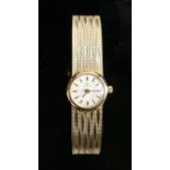 Omega ladies 9ct gold wristwatch: with 9ct gold bracelet, 24.8g.