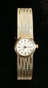 Omega ladies 9ct gold wristwatch: with 9ct gold bracelet, 24.8g.