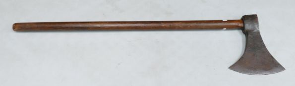 Early executioners type axe head: mounted on a later handle, L97cm.