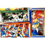 A collection of vintage Lego sets: Including Legoland sets 6055, 6061 and other sets and spares. (