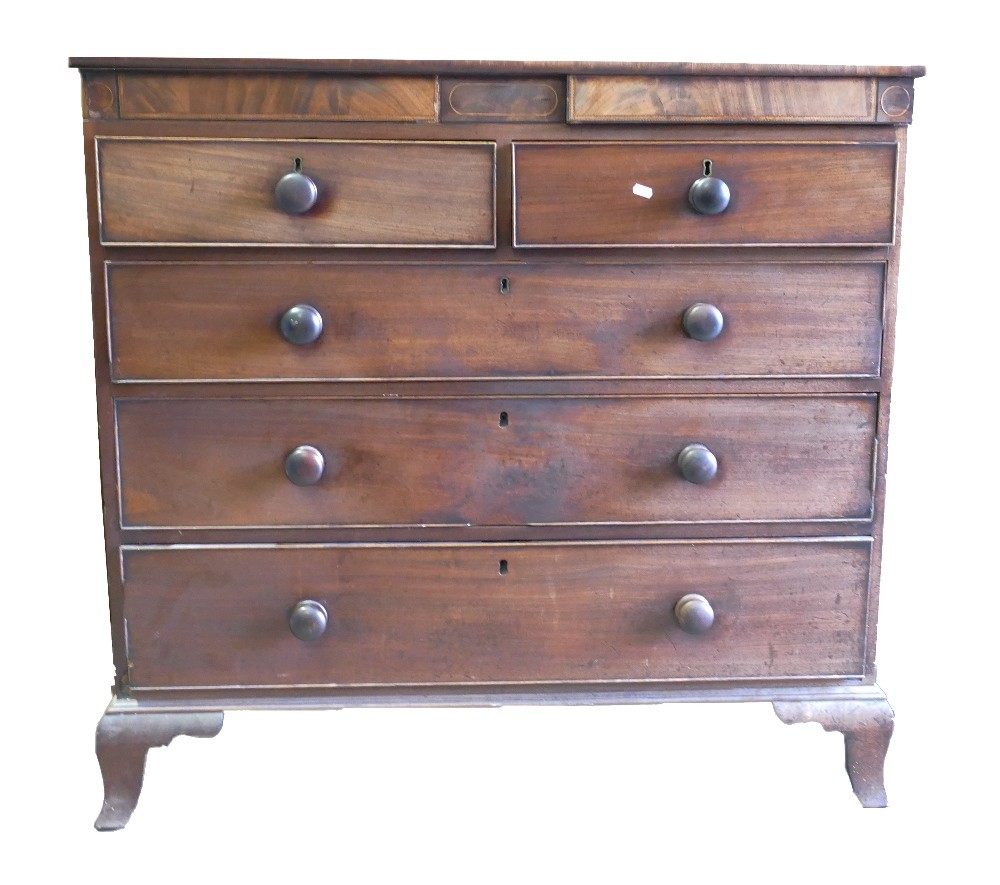 Inlaid Victorian chest of drawers: 2 over 3 in construction, with two secret drawers, bracket