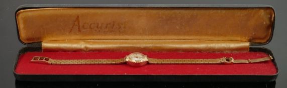9ct gold hallmarked Accurist ladies wrist watch and 9ct gold bracelet: Gross weight 18.3 g. Winds,