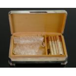 Silver desk cigarette box: hallmarked for Birmingham 1957, 15 x 9cm.