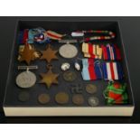 A collection of second world war medals and items: