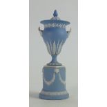 19th century light blue small rams head handled vase and cover: Height on stand 17cm.