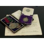 A collection of military /sporting medals: to include 1933 football medal awarded to 4969817 Lance