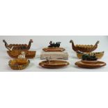 A collection of Wade porcelain dishes: Comprising 2 trains, man in a boat, Viking ships, Seagull