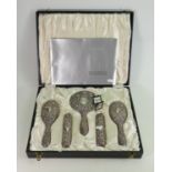 A Broadway Silversmiths brush set: comprising 4 brushes and mirror, in presentation box with