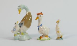 Wade 1950s models of comical ducks: Comprising Duck with baseball cap, Drake and daddy and duck. (3)