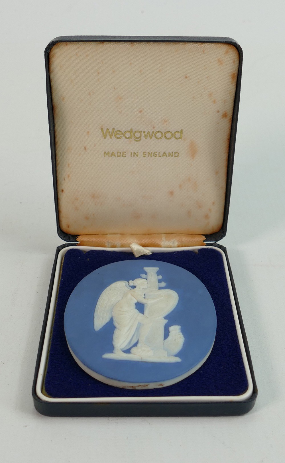 Wedgwood and Bentley oval dark blue Jasper medallion: Decorated with a winged angel. 8cm x 7cm.