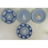 A collection of Wedgwood commemorative wall plates to include: Tri Colour Wedding Anniversary plate,