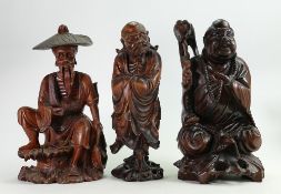 Three 19th century carved wood Chinese figures: Tallest measures 30.5 cm high.