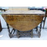 17th century Oak gateleg table: With drawer, length 105cm, width 48cm & depth 73cm