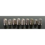 A collection of vintage silver thimbles (9):